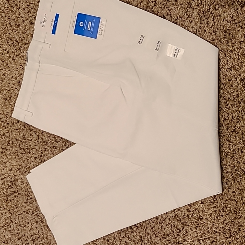 Greg Norman white pants
